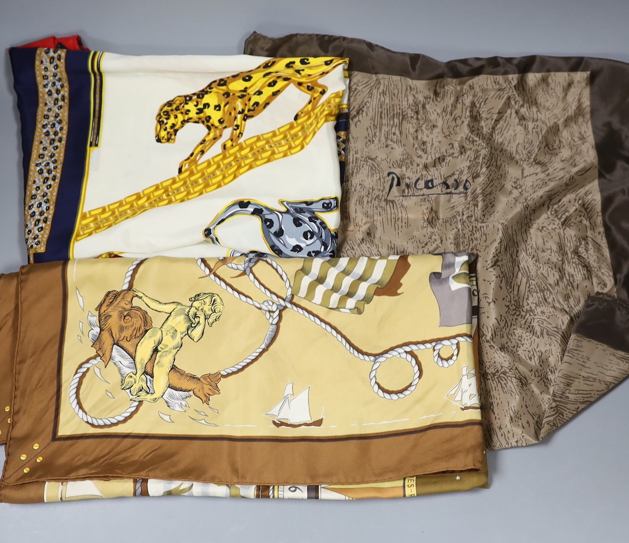 Two Hermes scarves, including a Jacques Eudel, together with an exhibition Picasso scarf (3)